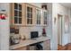 Home office space with built-in desk and cabinets for storage at 6375 Lolly Bay Ne Loop, Winter Haven, FL 33881