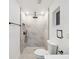 Clean bathroom with walk-in shower and toilet at 6455 Hemlock Rd, Ocala, FL 34472