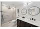 Modern bathroom with double vanity and walk-in shower at 6455 Hemlock Rd, Ocala, FL 34472