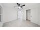 Bright bedroom with ceiling fan and closet at 6455 Hemlock Rd, Ocala, FL 34472