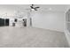 Modern kitchen featuring white cabinets, stainless steel appliances, and a large island at 6455 Hemlock Rd, Ocala, FL 34472