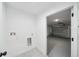 Bright laundry room with garage access and built-in storage at 6455 Hemlock Rd, Ocala, FL 34472