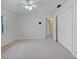 Large bedroom with a ceiling fan, closet and a window that brings in natural light at 647 Saranac Dr, Winter Springs, FL 32708