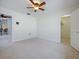 This is a bedroom with access to another room and a walk-in closet at 647 Saranac Dr, Winter Springs, FL 32708