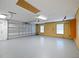 Spacious garage with plenty of room for parking and storage, with added peg board at 647 Saranac Dr, Winter Springs, FL 32708