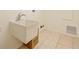 A utility sink is in the laundry room featuring tile floors at 647 Saranac Dr, Winter Springs, FL 32708