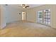 Large main bedroom offers a private entry to the sunroom through the glass-paned french doors at 647 Saranac Dr, Winter Springs, FL 32708