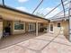 Inviting outdoor entertaining area with covered patio and outdoor kitchen features at 647 Saranac Dr, Winter Springs, FL 32708