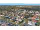 Wide aerial view of the house and surrounding neighborhood at 7400 Soiree Way, Reunion, FL 34747