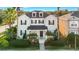 Two-story house with a landscaped yard and driveway at 7400 Soiree Way, Reunion, FL 34747