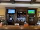Upscale bar with multiple screens showing sports at 7400 Soiree Way, Reunion, FL 34747
