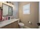 Clean bathroom with quartz countertop and modern fixtures at 7400 Soiree Way, Reunion, FL 34747