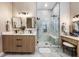 Modern bathroom with a large walk-in shower and double vanity at 7400 Soiree Way, Reunion, FL 34747