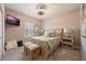 Relaxing bedroom with a king-size bed and neutral tones at 7400 Soiree Way, Reunion, FL 34747