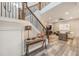 Bright entryway with staircase and view to the living room at 7400 Soiree Way, Reunion, FL 34747