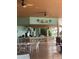 Relaxing poolside bar with seating and TVs at 7400 Soiree Way, Reunion, FL 34747