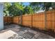 Small fenced patio with fire pit at 7474 Canford Ct # 13, Winter Park, FL 32792