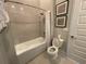 Bathroom with tub and shower at 7740 Sandy Ridge Dr # 205, Reunion, FL 34747