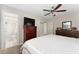 Large bedroom with a dresser and adjacent bathroom access at 8465 Oak Bluff Dr, Orlando, FL 32827