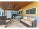 Relaxing patio area with seating, covered pergola, and grill at 8465 Oak Bluff Dr, Orlando, FL 32827