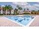 Refreshing community pool with lounge chairs at 11508 Westwood Blvd # 313, Orlando, FL 32821