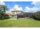 Large backyard with a pool and screened enclosure at 13412 Heswall Run, Orlando, FL 32832