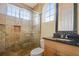 Bathroom with shower and granite countertop vanity at 13412 Heswall Run, Orlando, FL 32832