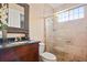 Bathroom boasts granite countertop, large shower, and updated fixtures at 13412 Heswall Run, Orlando, FL 32832