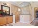 Spa-like bathroom with granite countertops, large shower, and updated fixtures at 13412 Heswall Run, Orlando, FL 32832
