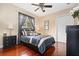 Guest bedroom with comfortable bed and hardwood floors at 13412 Heswall Run, Orlando, FL 32832