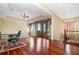 Spacious home office with hardwood floors, built-in speakers and large windows at 13412 Heswall Run, Orlando, FL 32832