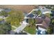 Aerial view of house, driveway, and neighborhood surroundings at 1511 Oak Hill Trl, Kissimmee, FL 34747