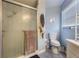 Clean bathroom with a shower, toilet, and vanity at 1511 Oak Hill Trl, Kissimmee, FL 34747