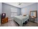 Cozy bedroom with a double bed, TV and dresser at 1511 Oak Hill Trl, Kissimmee, FL 34747