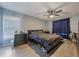 Bright bedroom with a double bed and plenty of storage at 1511 Oak Hill Trl, Kissimmee, FL 34747