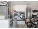 Laundry room with washer, dryer, and water heater at 1511 Oak Hill Trl, Kissimmee, FL 34747