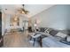 Living room with sectional sofa, coffee table, and access to patio at 1511 Oak Hill Trl, Kissimmee, FL 34747