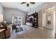 Living area with sectional sofa, large TV, and pool access at 1511 Oak Hill Trl, Kissimmee, FL 34747