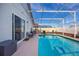 Enjoy this screened pool and spacious patio area at 1511 Oak Hill Trl, Kissimmee, FL 34747