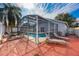 Screened pool with patio and lounge chairs at 1511 Oak Hill Trl, Kissimmee, FL 34747
