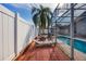Relaxing patio with lounge chairs near pool at 1511 Oak Hill Trl, Kissimmee, FL 34747
