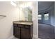 Bathroom with dark brown vanity and granite countertop at 223 Cherokee Hill, Deland, FL 32724