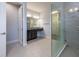Primary bathroom with large shower and double vanity at 223 Cherokee Hill, Deland, FL 32724