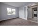 Bright bedroom with carpet flooring and an exterior view at 223 Cherokee Hill, Deland, FL 32724