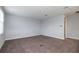 Spacious bedroom with plush carpet and neutral walls at 223 Cherokee Hill, Deland, FL 32724