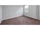 Spacious bedroom with carpeted floor and a window at 223 Cherokee Hill, Deland, FL 32724