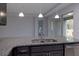Modern kitchen features granite countertops, stainless steel appliances, and an island at 223 Cherokee Hill, Deland, FL 32724
