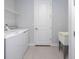 Laundry room with washer, dryer, and utility sink at 223 Cherokee Hill, Deland, FL 32724
