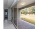 Sliding glass doors lead to a covered patio at 223 Cherokee Hill, Deland, FL 32724
