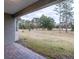 View from patio showcasing backyard landscape at 223 Cherokee Hill, Deland, FL 32724